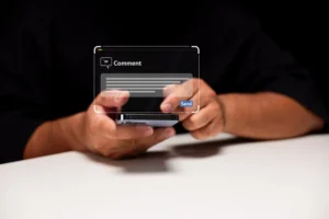 A person types a comment on a smartphone.